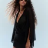 Minikleid mit Flügelärmeln Minikleid mit Flügelärmeln